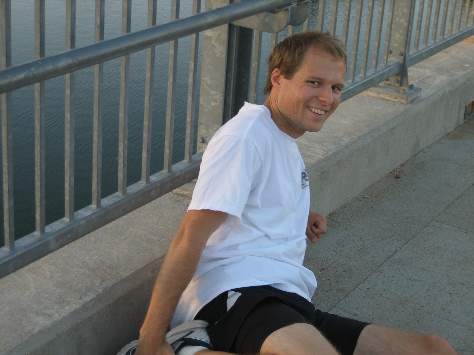 Stretching out on the Lamar Street Pedestrian foot bridge.