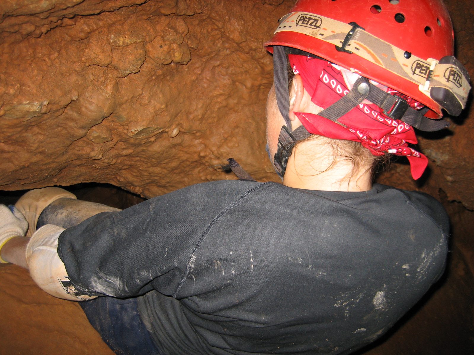 Catherine, lowering herself into the pleasantly named crevice "Chest Crusher".