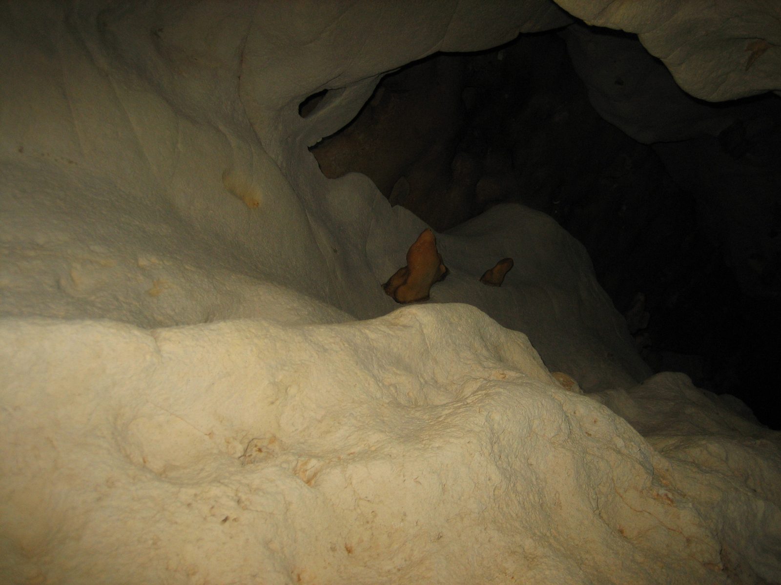 Strange mineral formations above us in the canyon.
