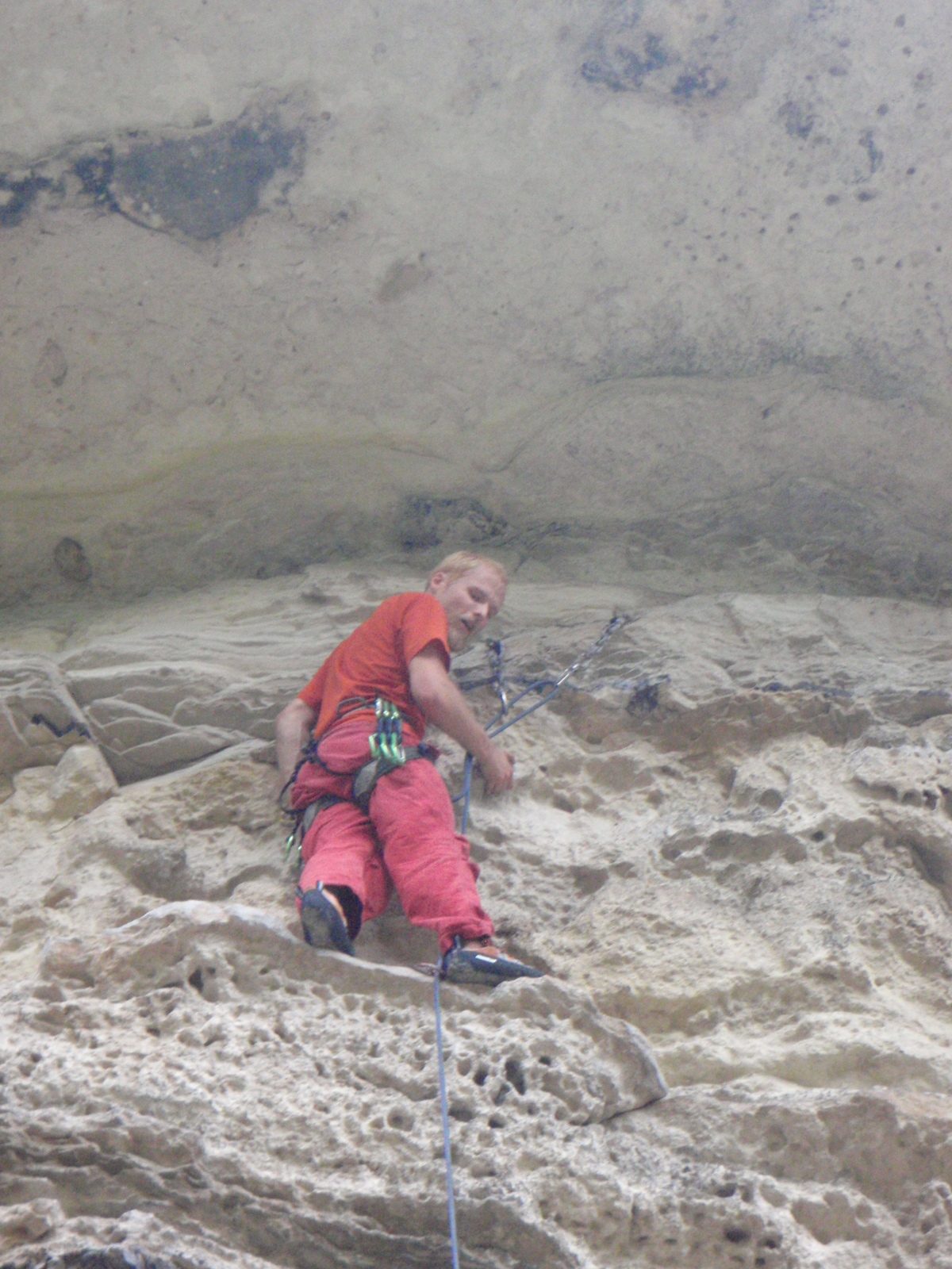 John, after clipping the anchors on the 5.10d.  The climb also continues to another set of...