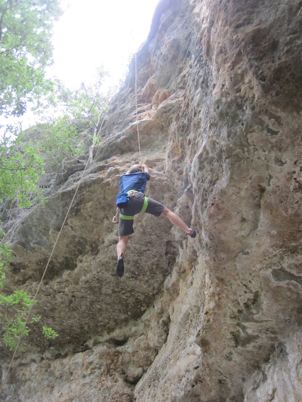 Both feet off the wall.