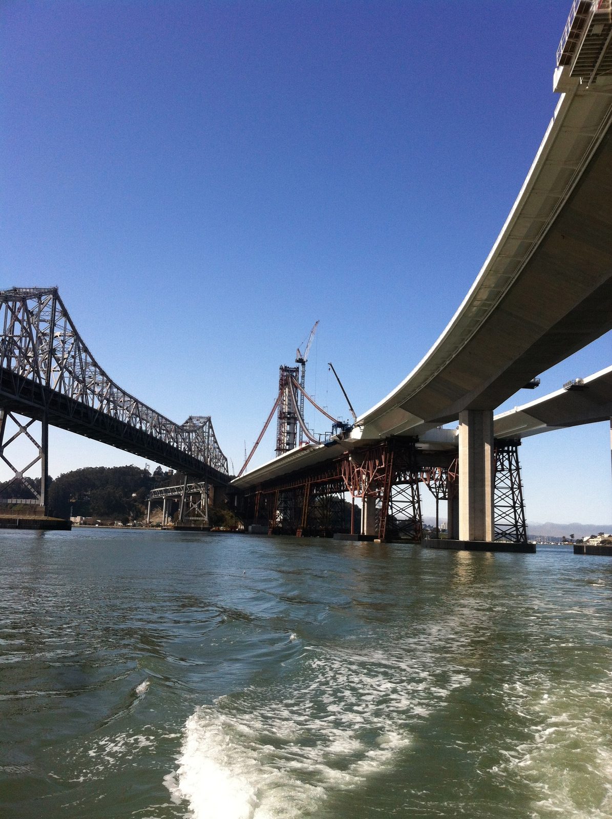 New skyway and old Bay Bridge.