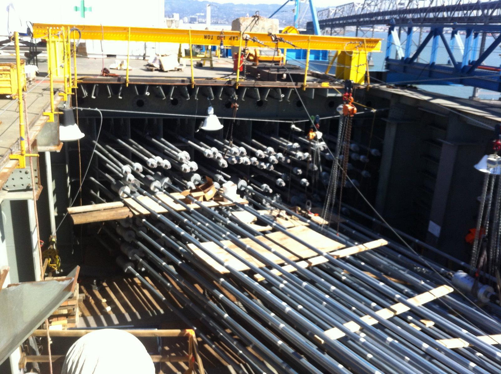 I love that even this "small" task has necessitated a gantry crane, presumably to help guide the...