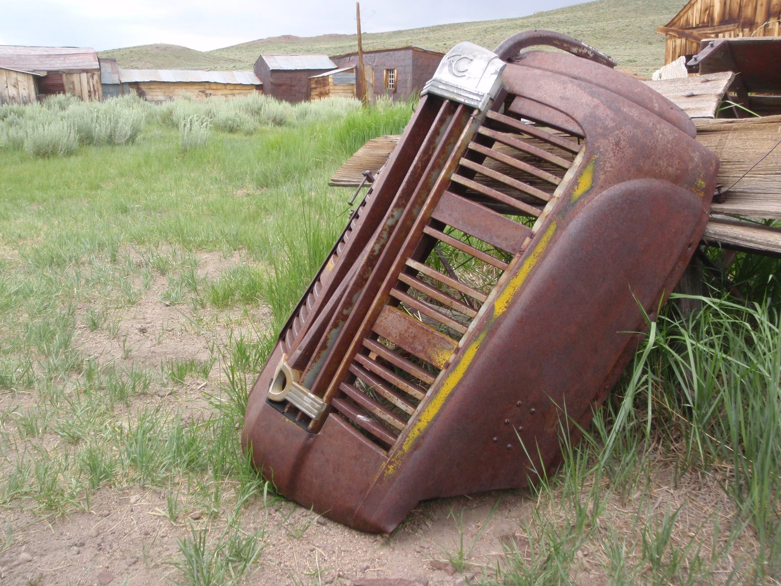 Part of an old GMC car or truck.