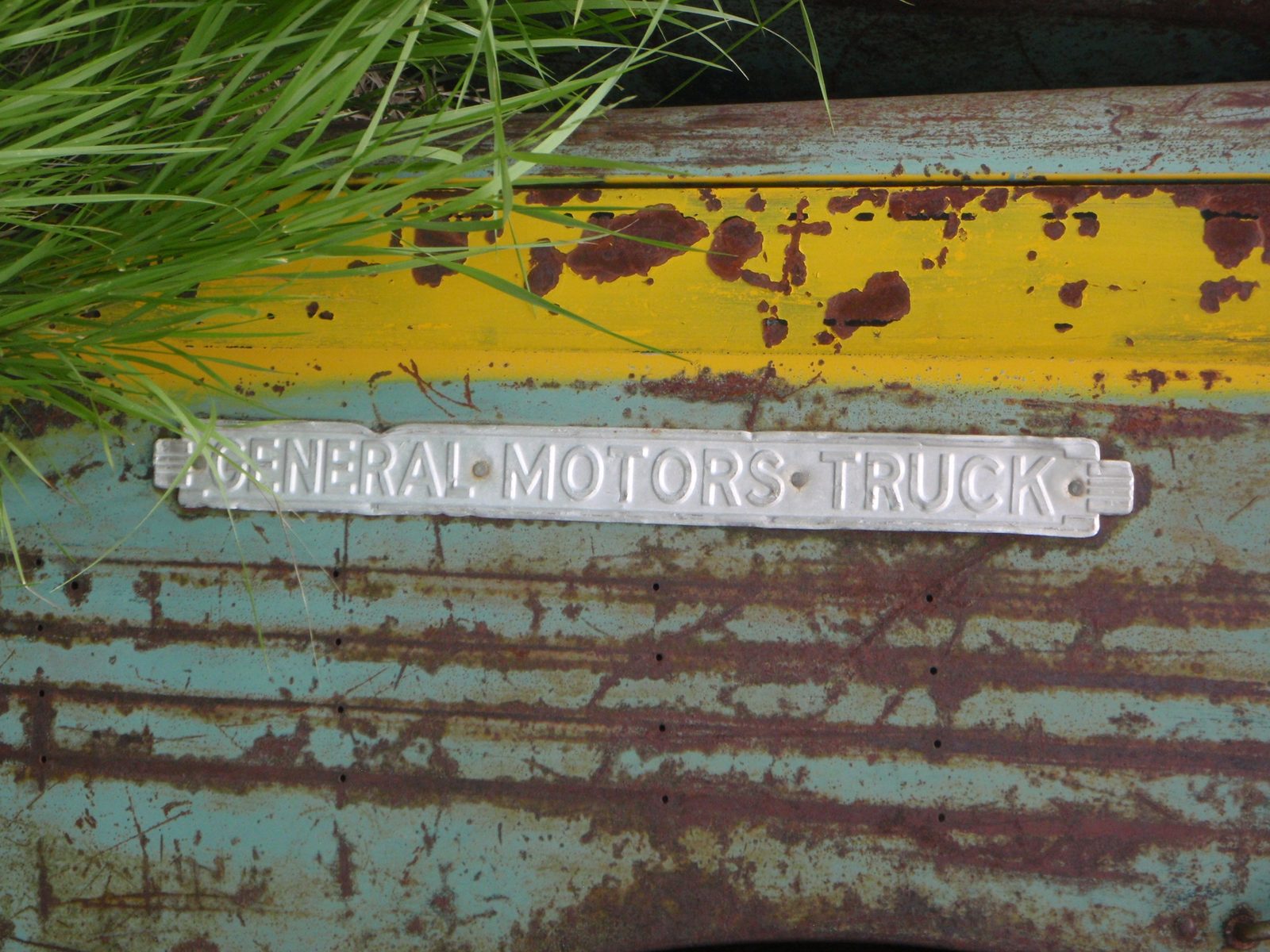 They don't build them like they used to. Now it would say "Government Motors Truck". Haha.