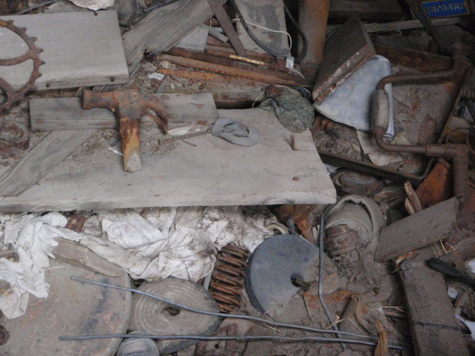 Piles of junk in the mechanic's shop.