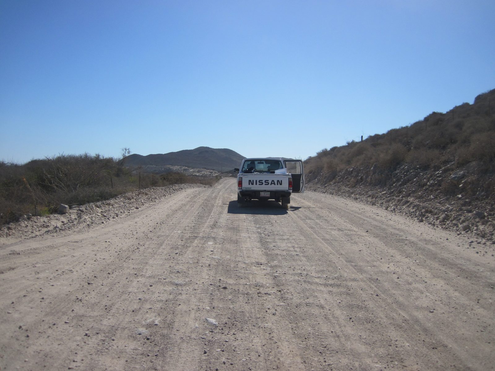 After packing up camp, we hopped back in the Nissan Frontier and headed south down the coast (we...