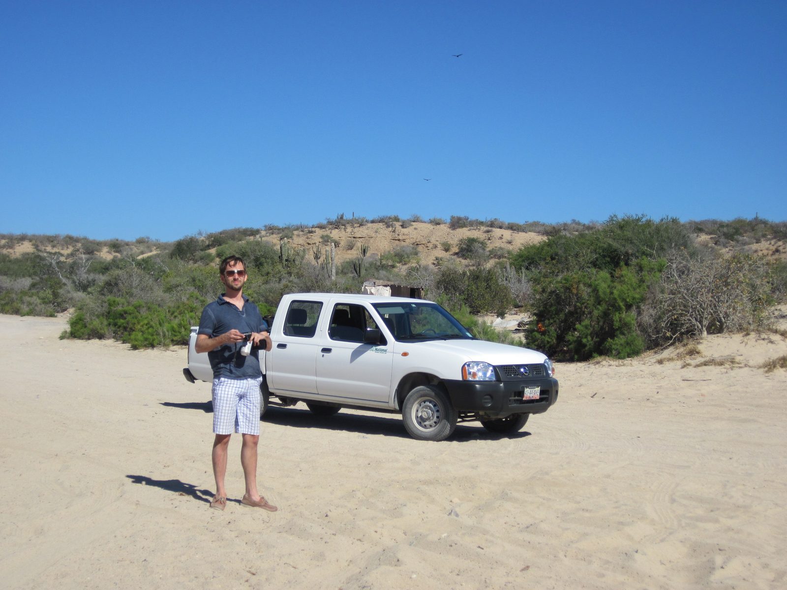 Jon, standing on the Frailes beach, with our truck in the background.