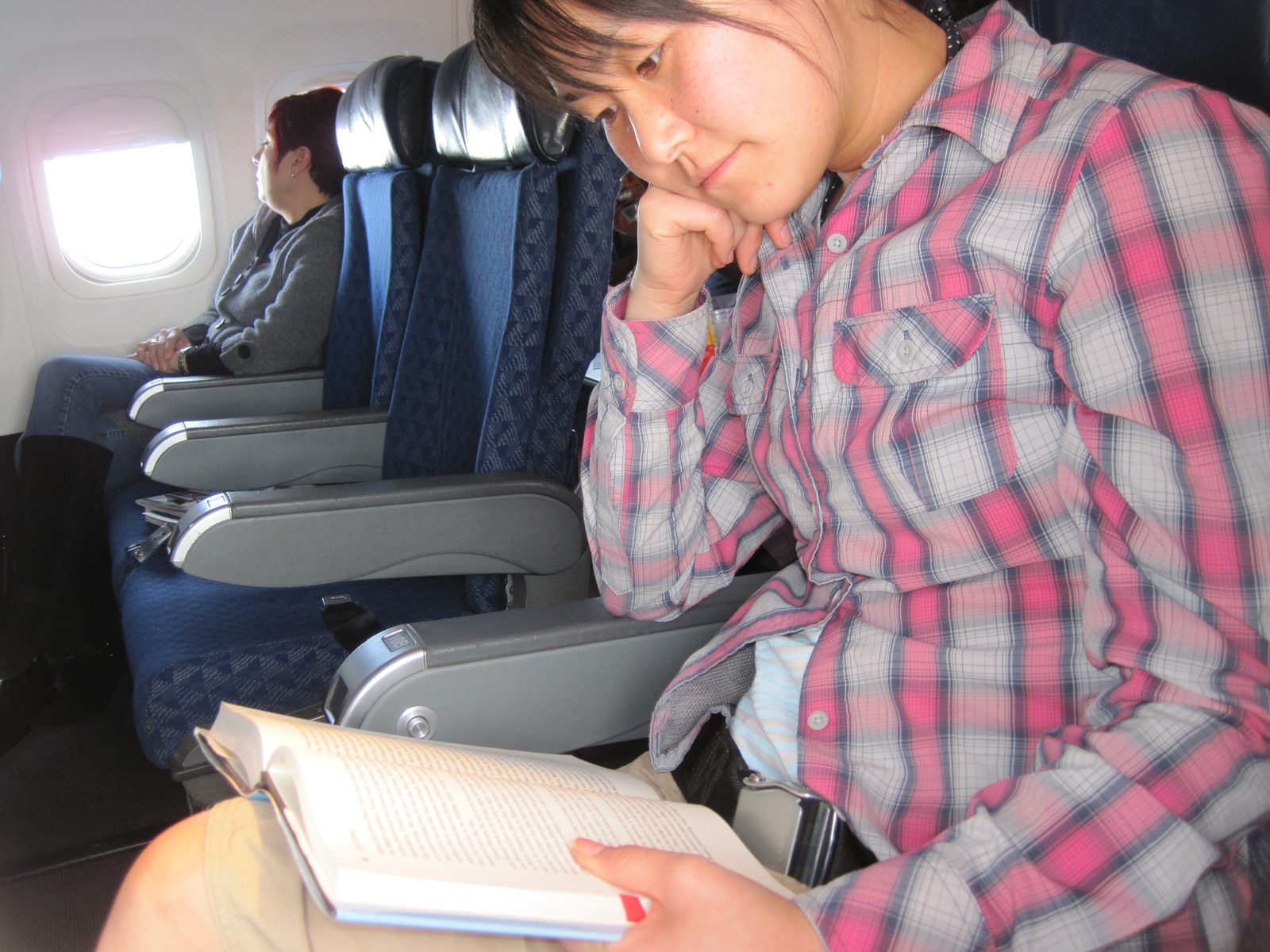 Monica looking excited to be reading her book.