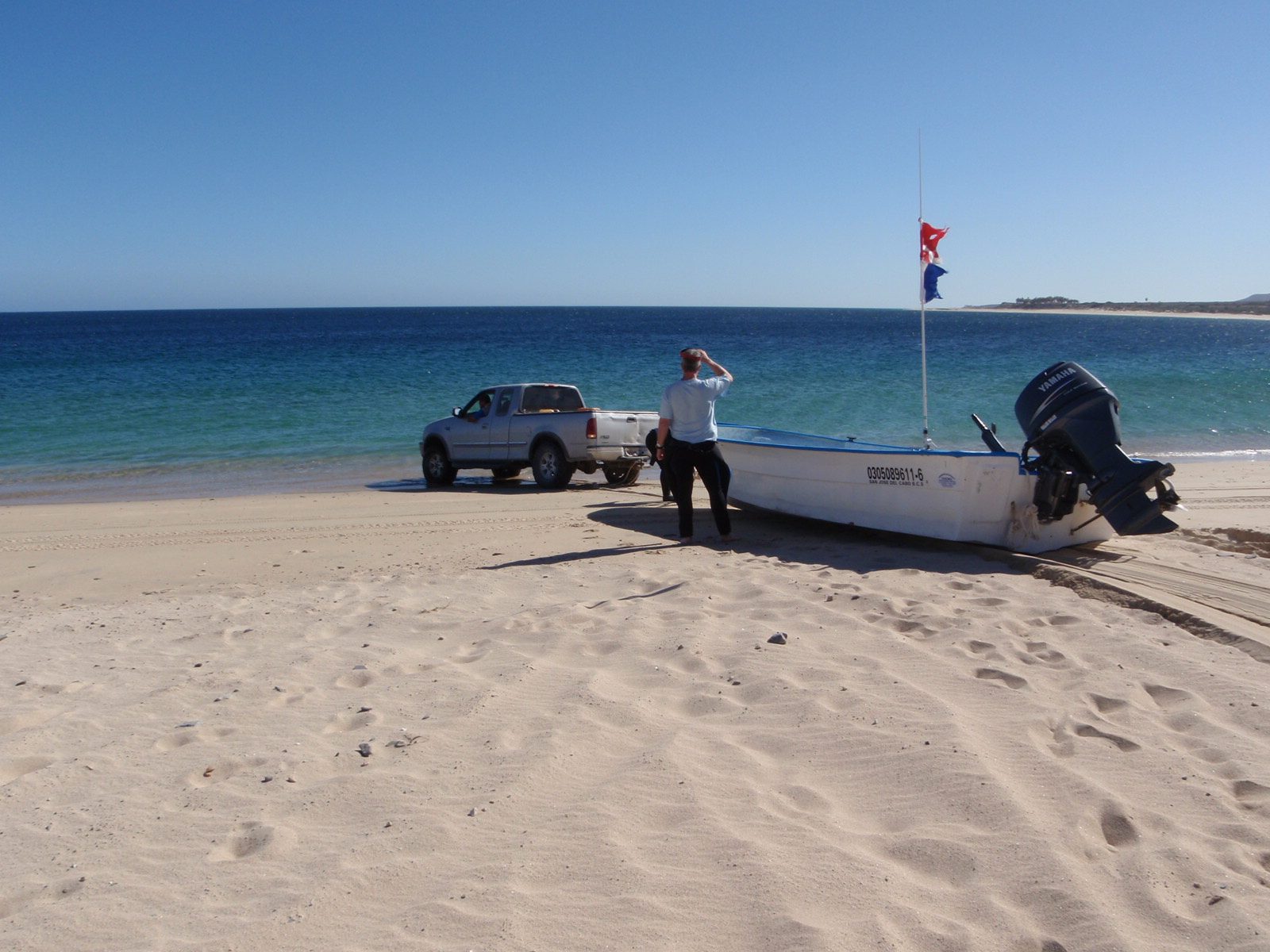 So apparently after the truck gets the boat as close to the water as it can with the tow rope,...