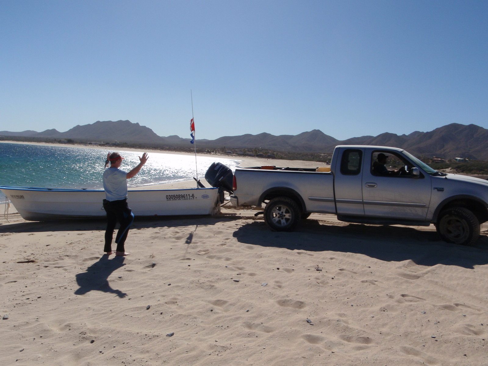 Step 1: back up truck until it contacts boat.