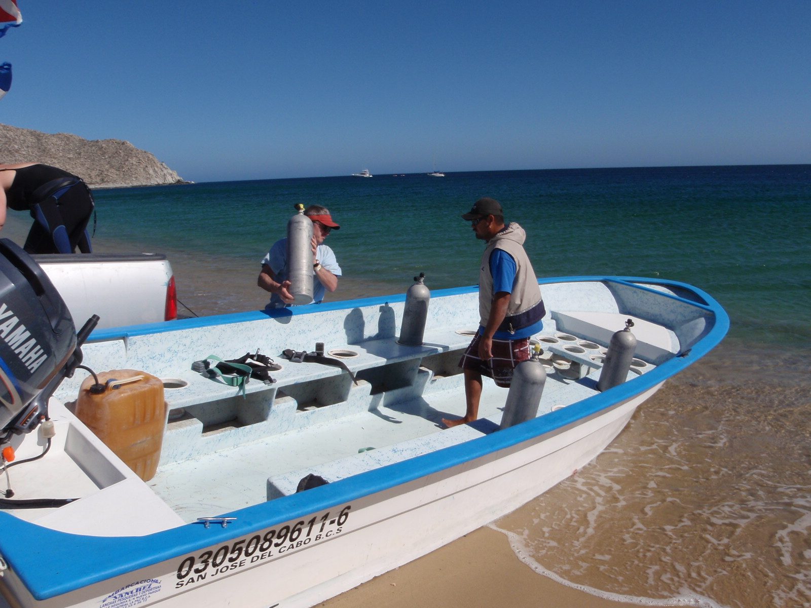 Loading up the boat. Actually, I forgot a crucial step. First you push boat halfway into the...