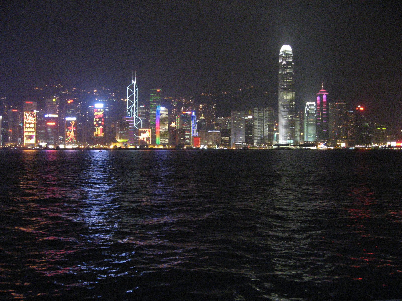 Hong Kong skyline by night as viewed from the "Walk of the Stars" -- Hong Kong's version of...