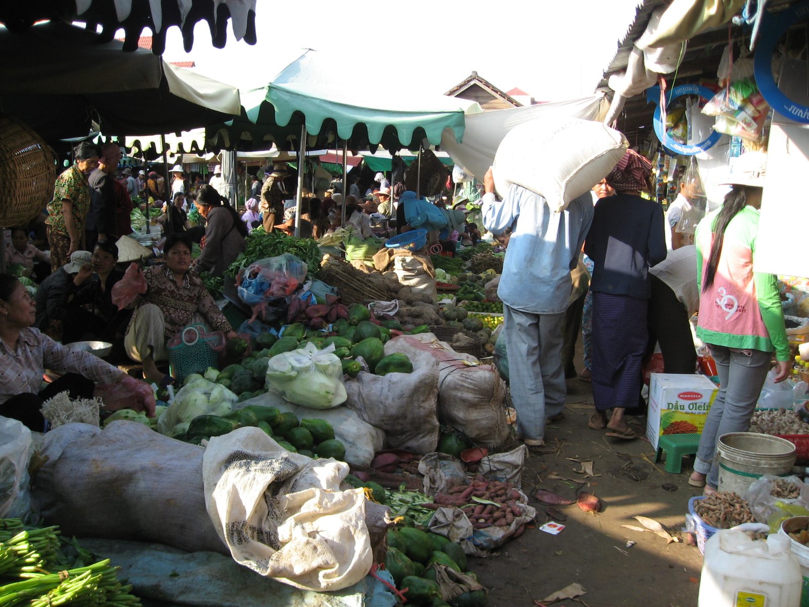 Green market in Kampot.  It was such a rabbit-warren of little stalls and and stands selling...
