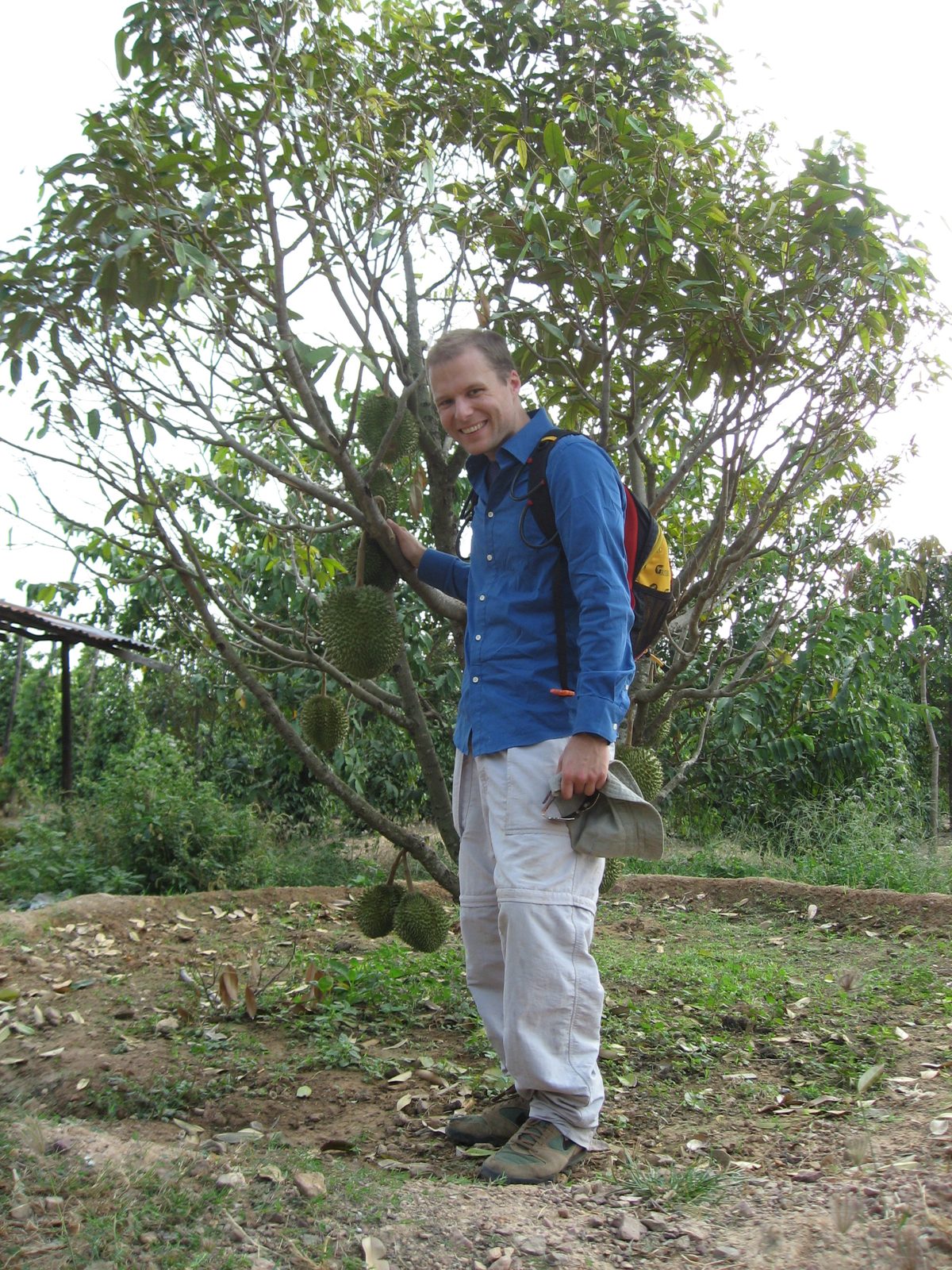 John next to a durian tree.