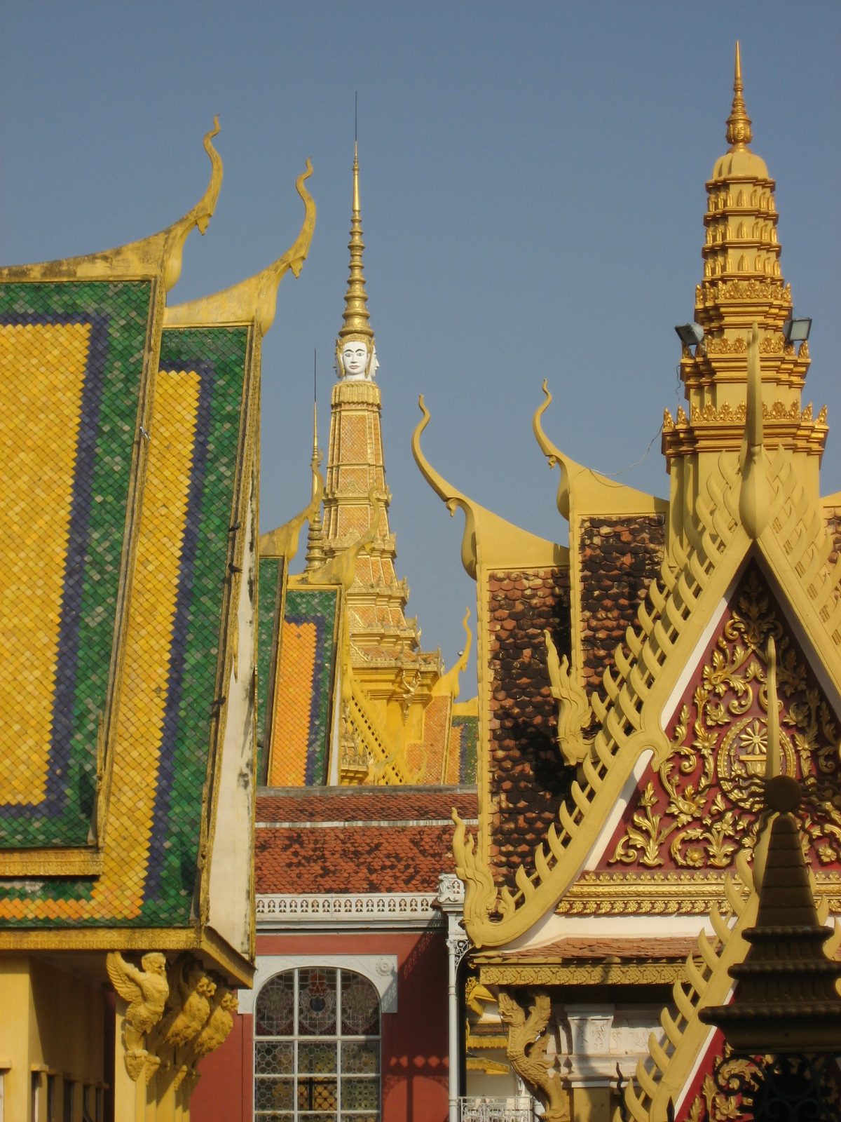A picture of many Royal Palace buildings taken from the steps of the Silver Pagoda, a building I...