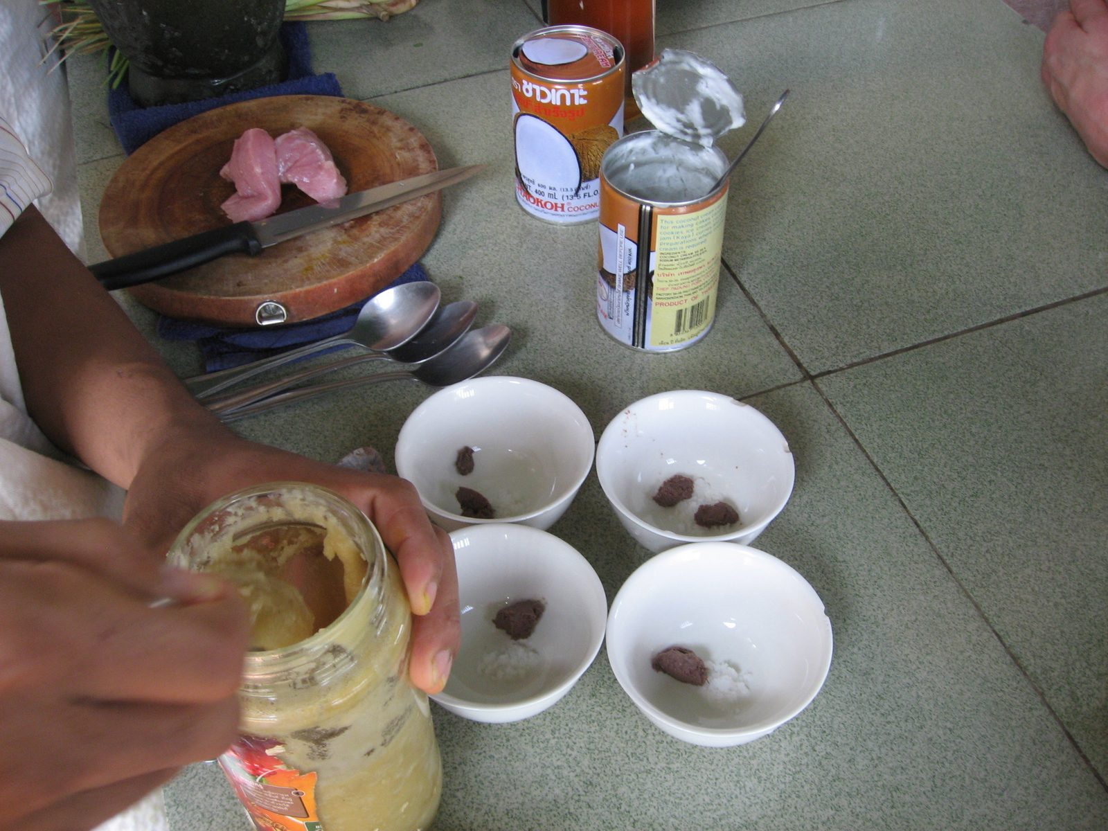 Shrimp paste, rock salt, palm sugar, and in the background, pork, and coconut milk.  Adding...