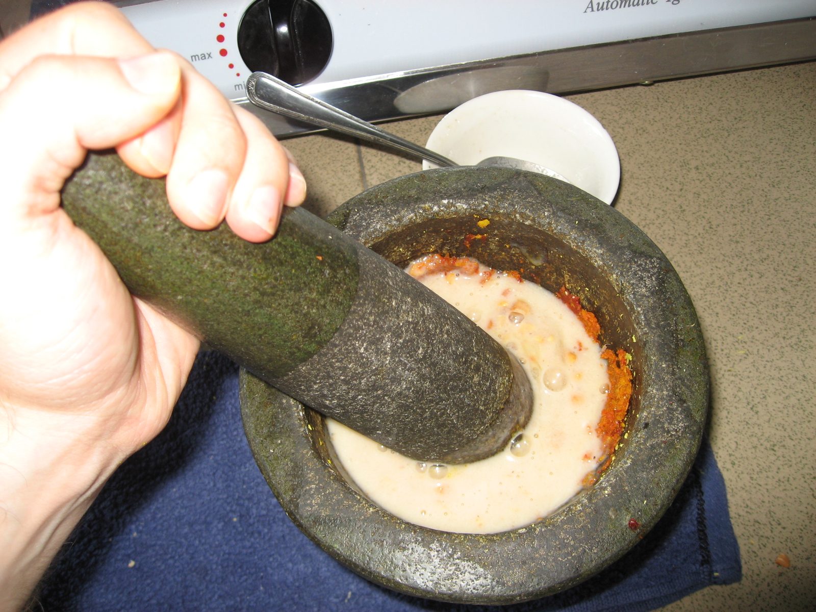 I think I should have been using a spoon for this.  Mixing the fish/coconut milk concoction with...