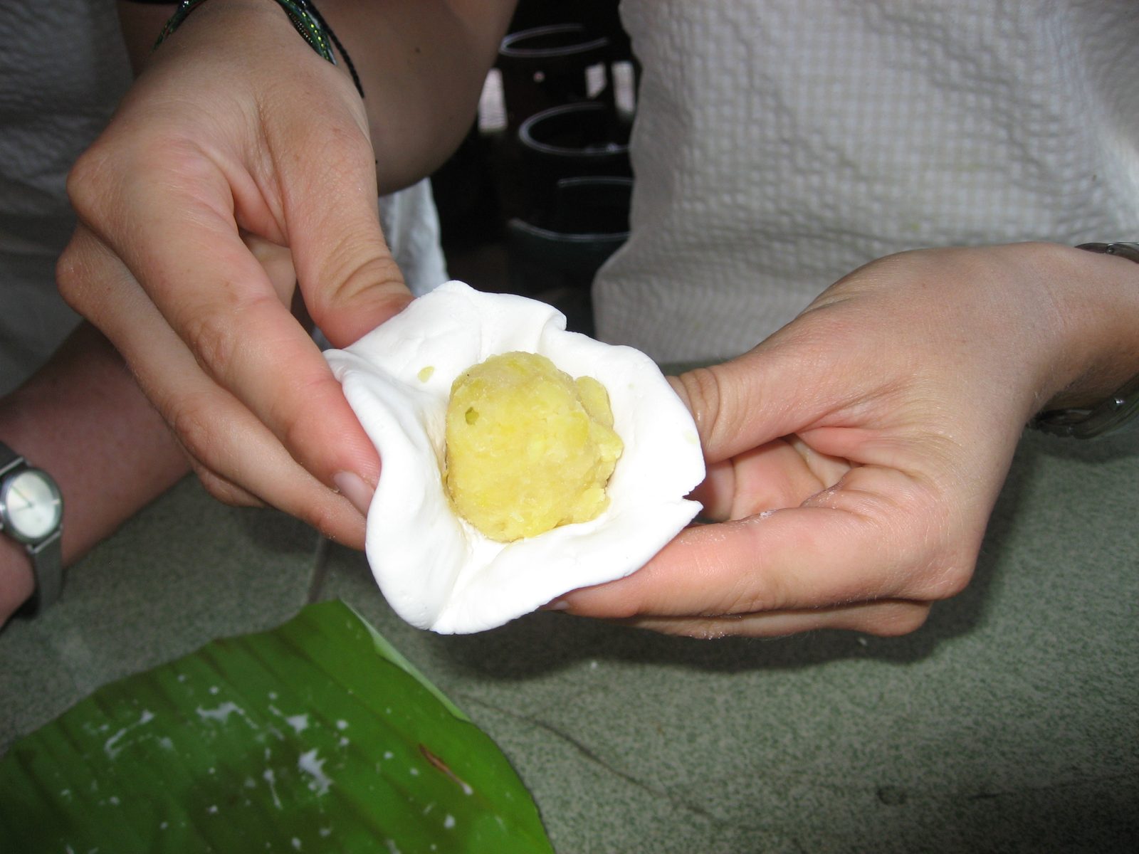 Mung bean paste goes inside the glutenous rice flour dough, and is finally wrapped in banana leaf.