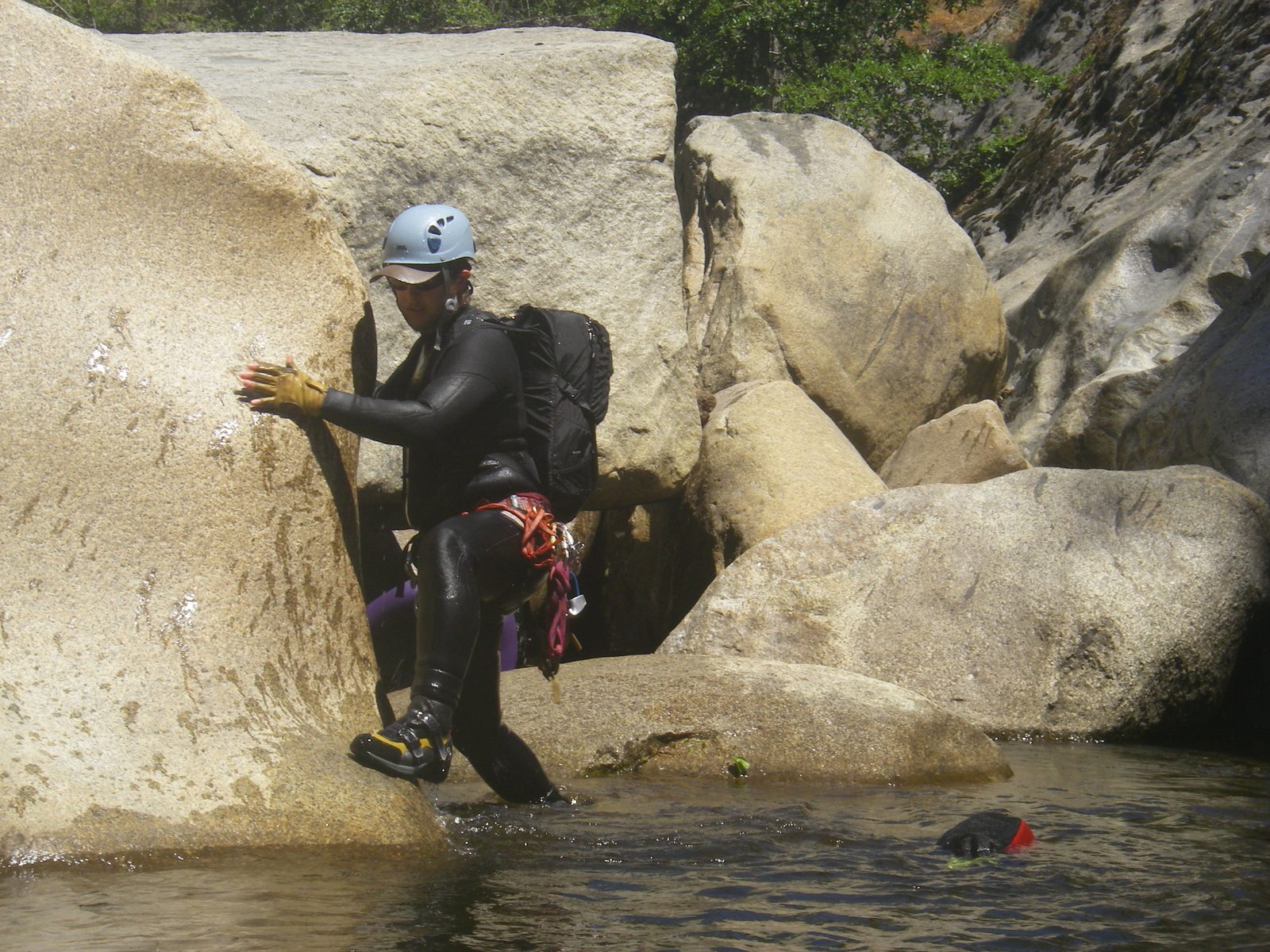 Mike tiptoeing around a pool.