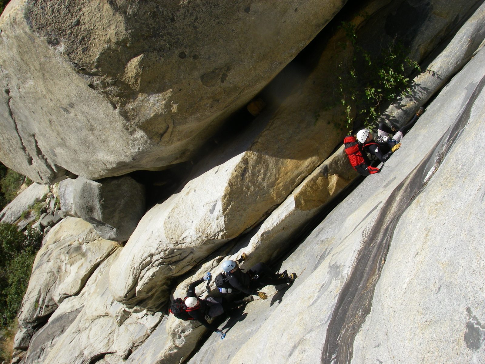 John leading the way down a rock chute into a pool, right after lunch.