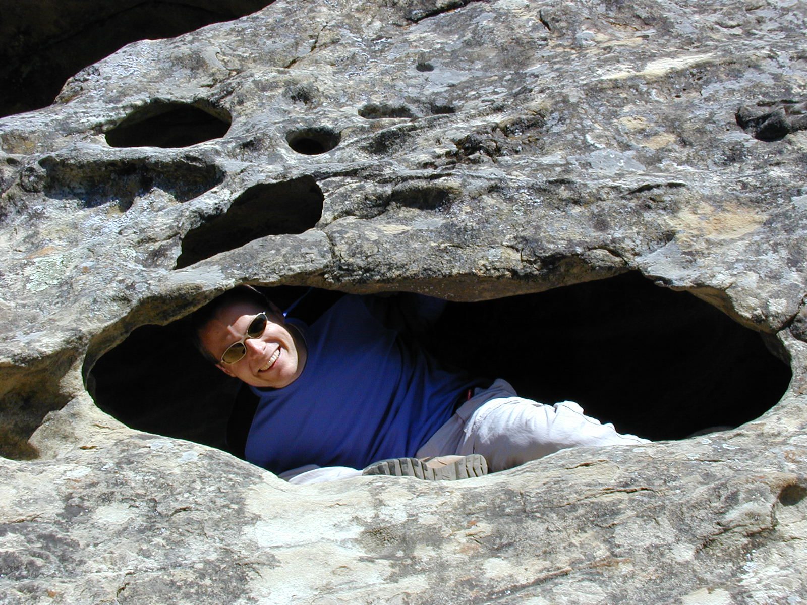 John hanging out in a swiss-cheese rock cave.