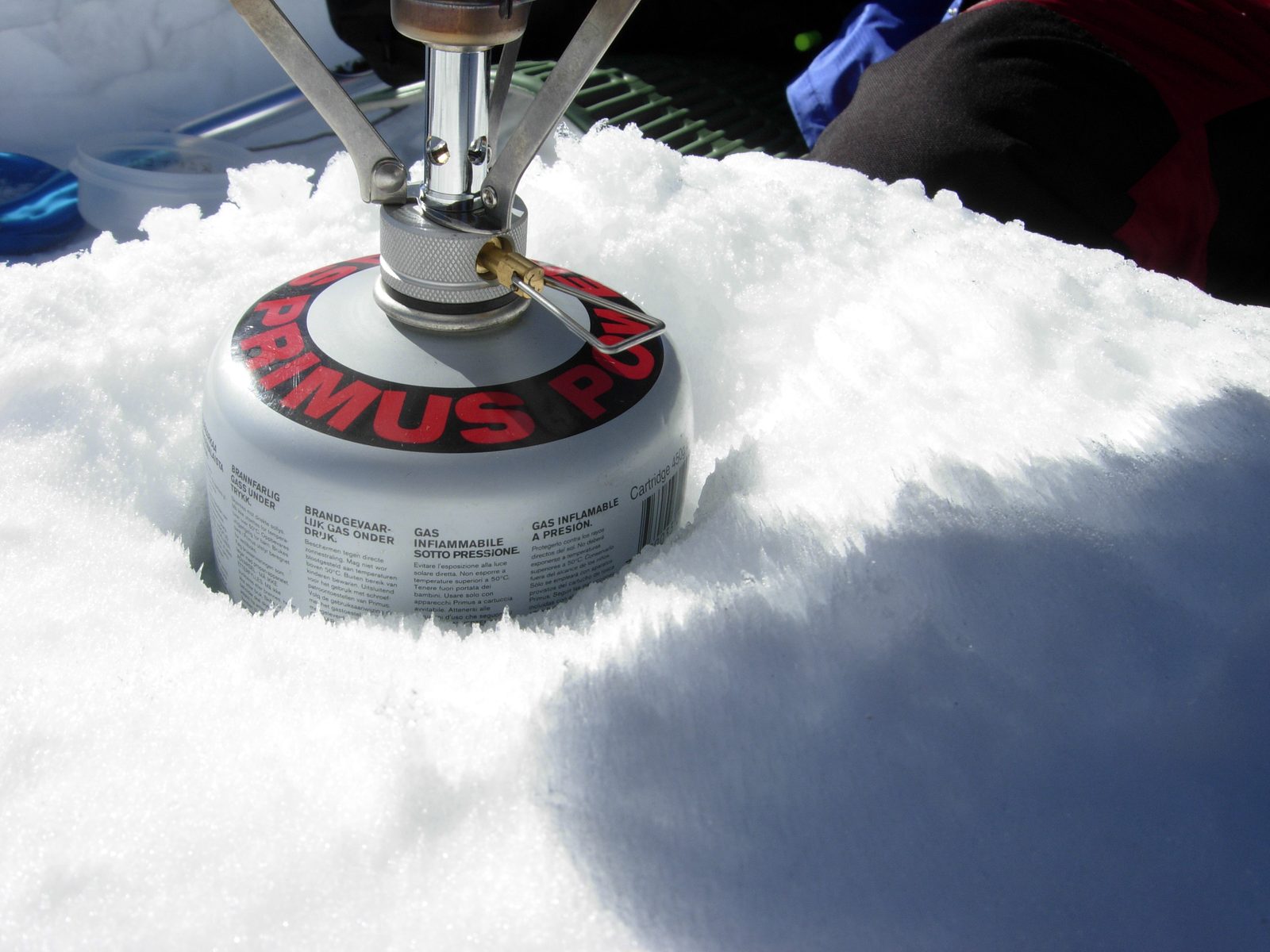 The weirdest thing was happening to the snow around our stove.  John's theory: the radiated heat...