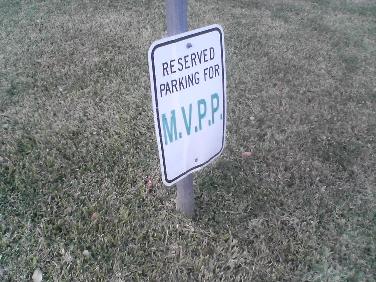 Close up of Lumberg's parking placard, slightly modified.  Which makes me wonder, who is putting...