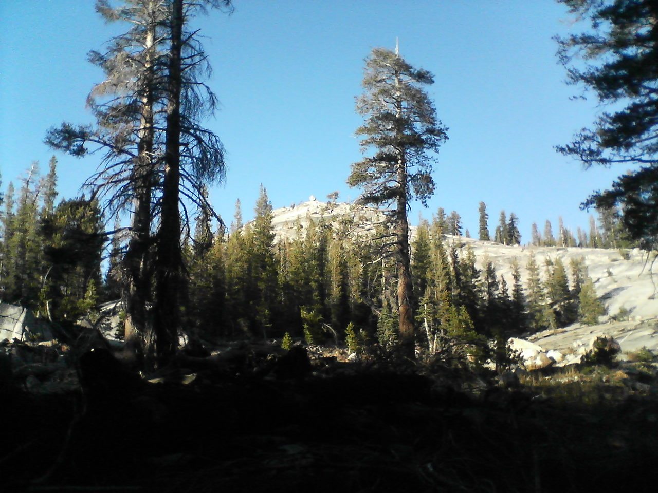 Dome with a big boulder on top of it.
