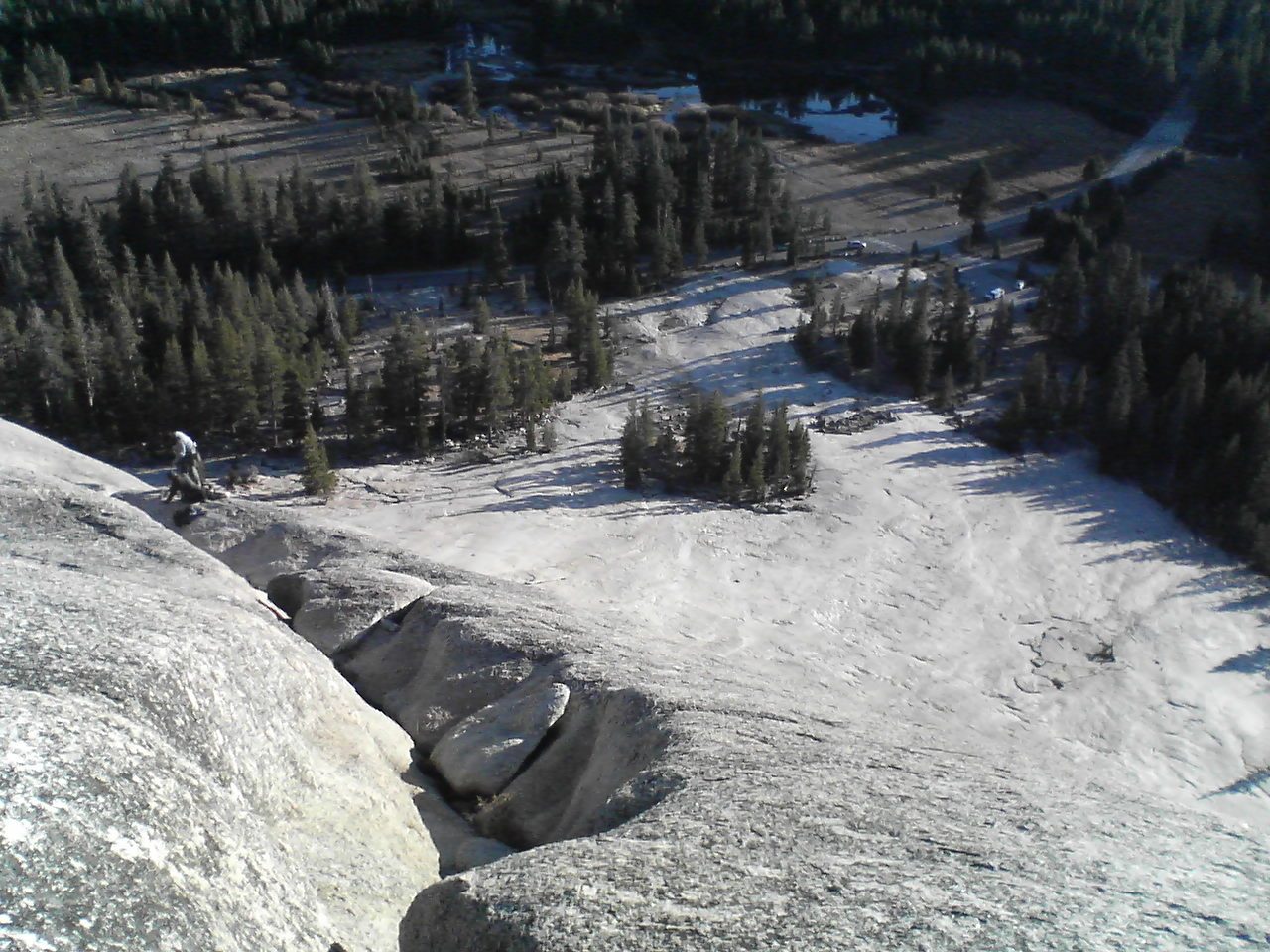 Walking off to the top of Lembert Dome.