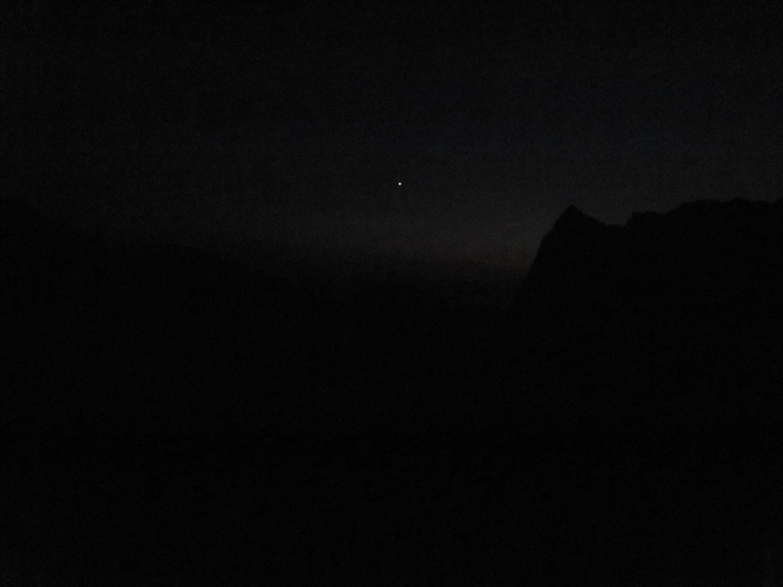 ... and before long total darkness descended. The moon had long since set and wasn't due to...