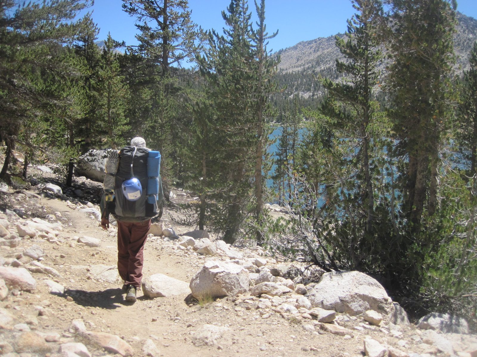 Joel, walking west along the shore of Charlotte Lake.