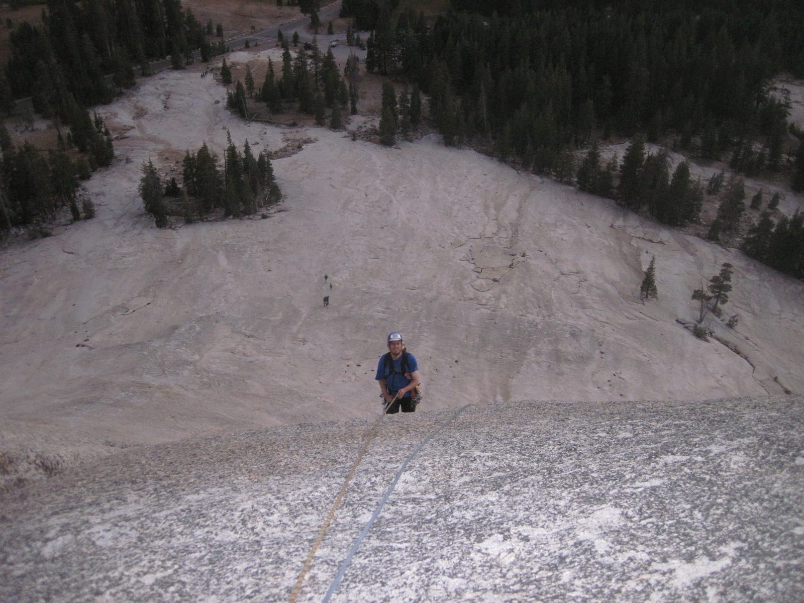 The rest of the climb went without incident and here is Joel rappelling down to safety just...