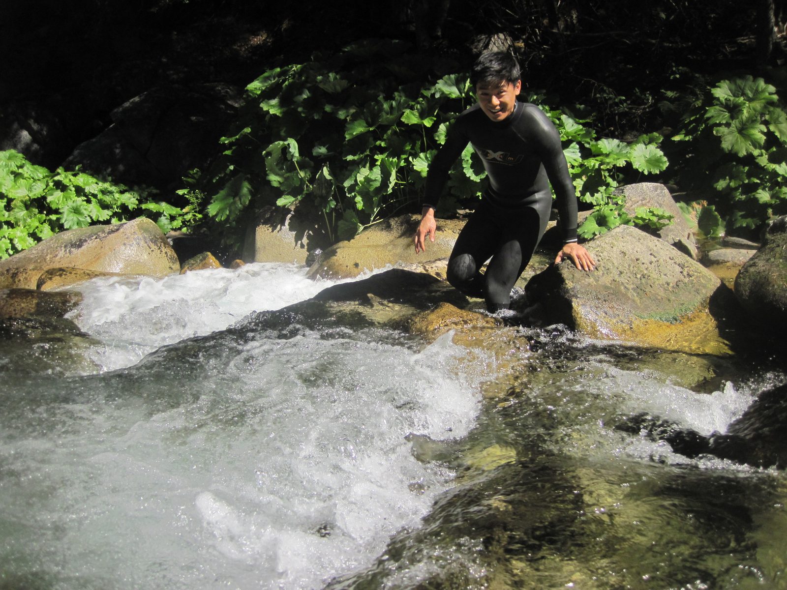 Yang getting in the water at the start. This river had a lot more water than we were used to. It...