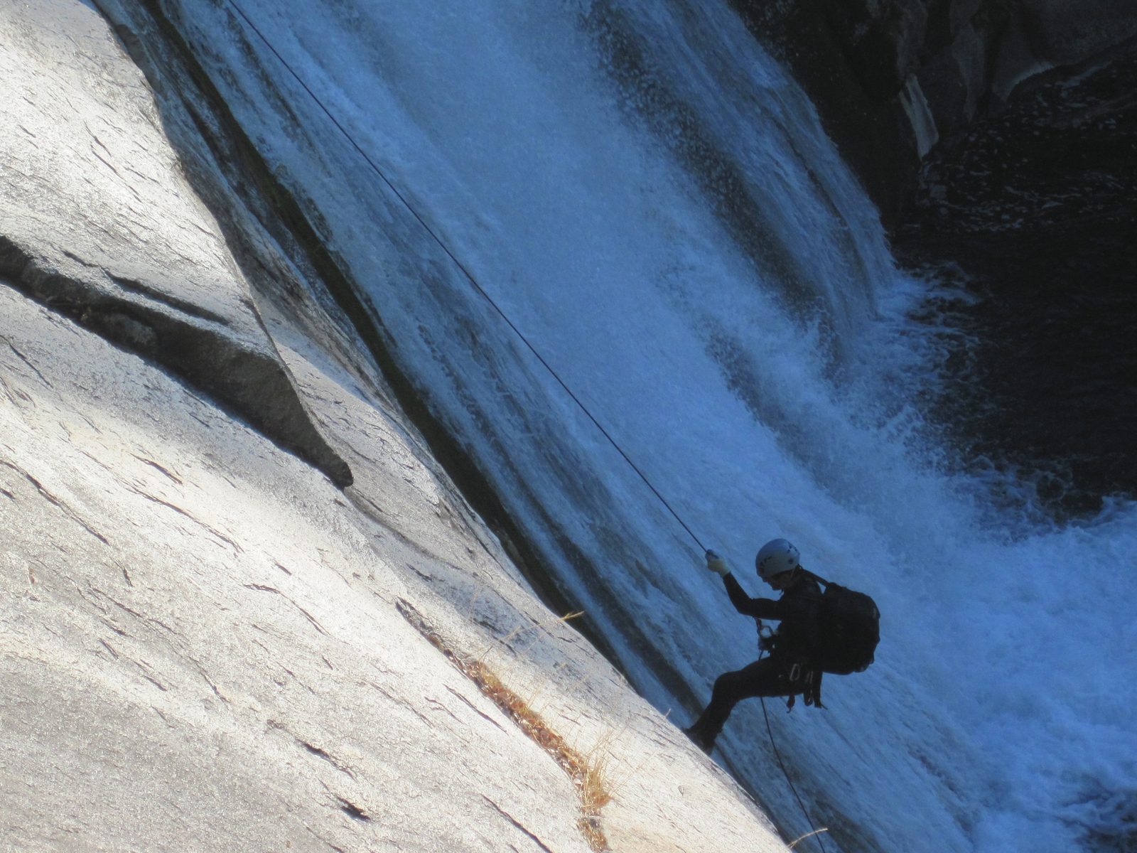 Vinnie, finishing out the rappelling for the day. We were all ready to get dry by this point.