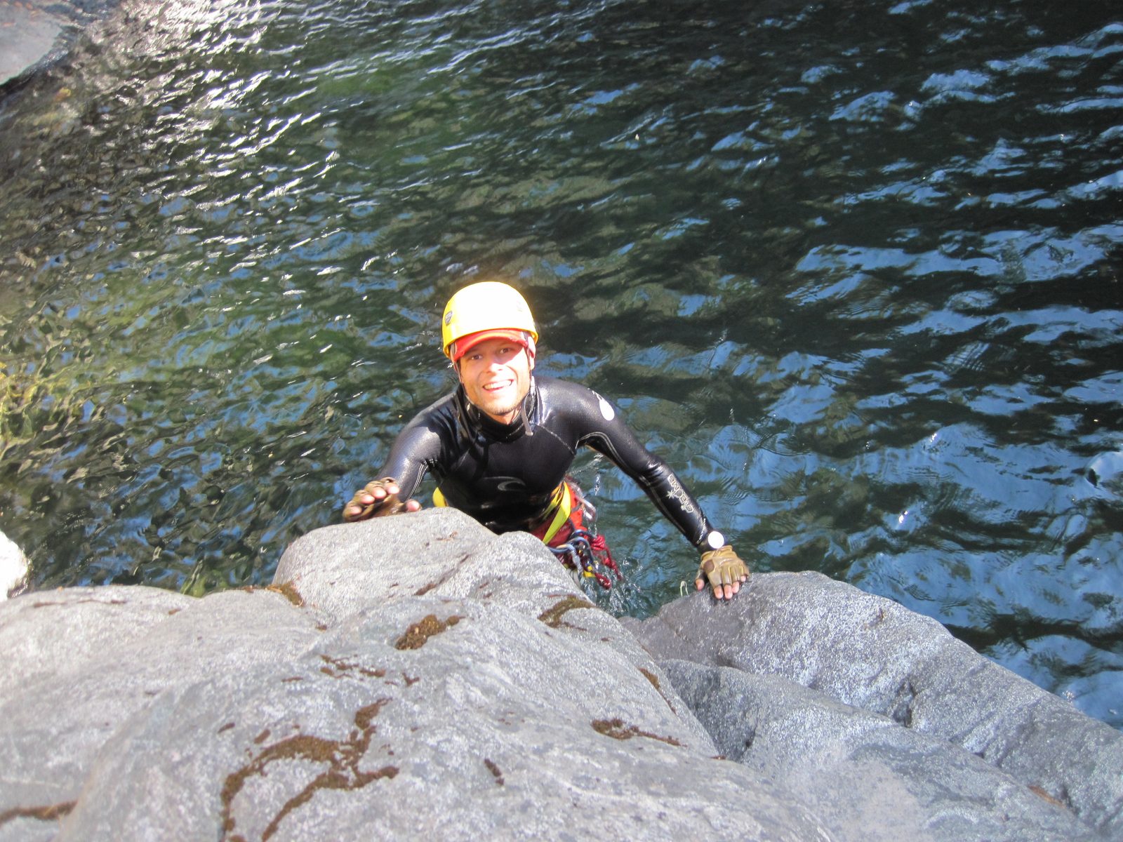 John, climbing out of the river after a jump.