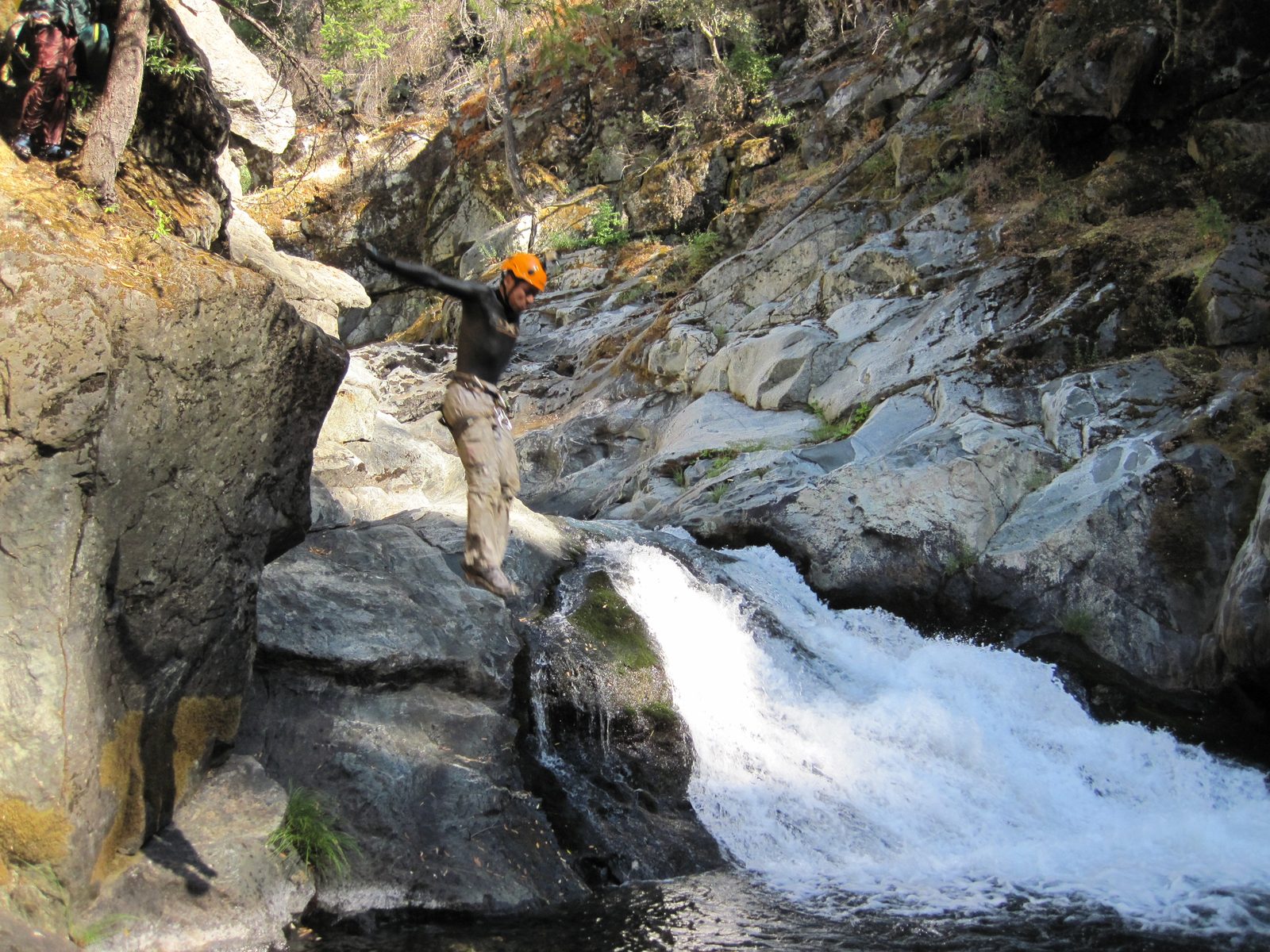 Yang, jumping into the river.