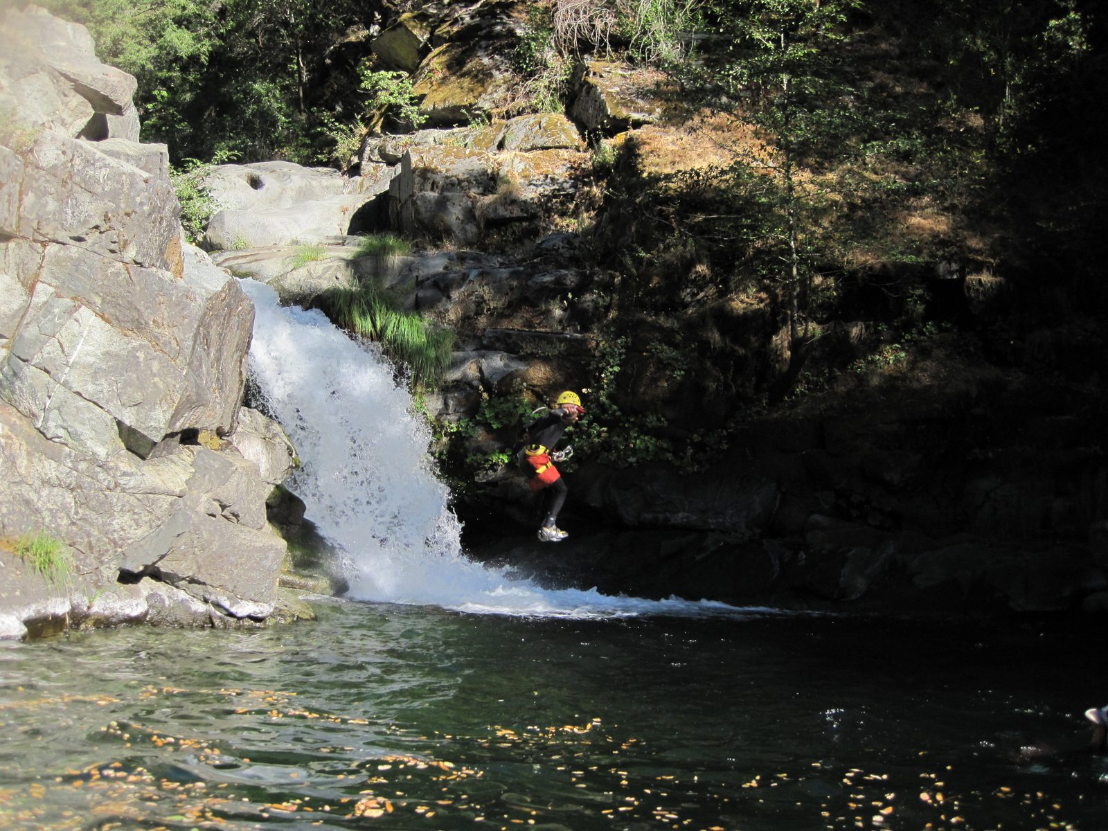 John in mid-air leap.