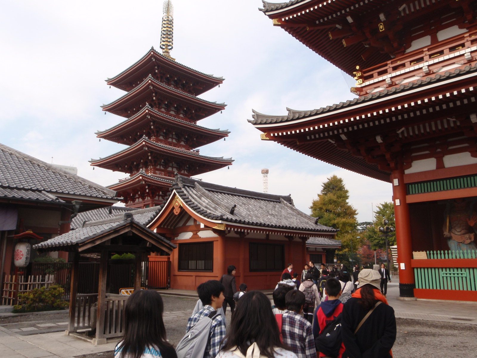 Part of the Asakusa temple complex. The wooden statue at the far right was carved from a single tree.