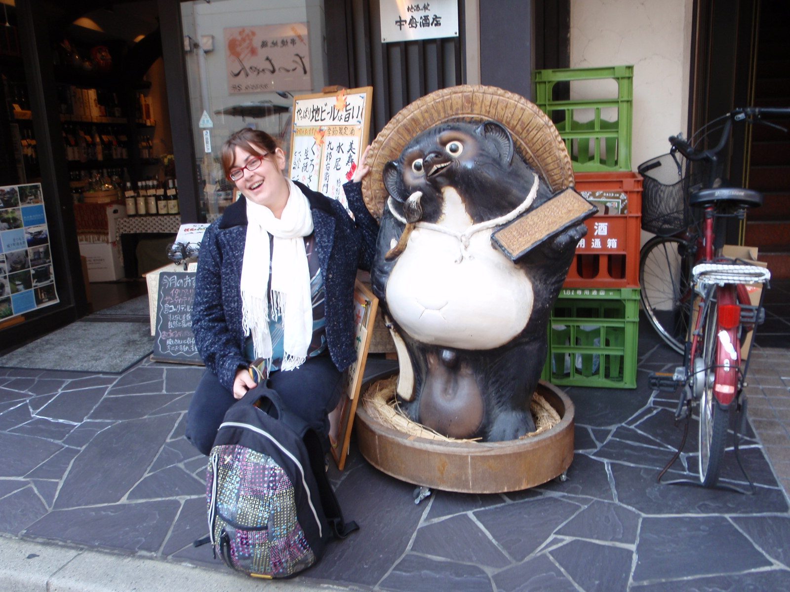Cass posses with a carved woodland critter.
