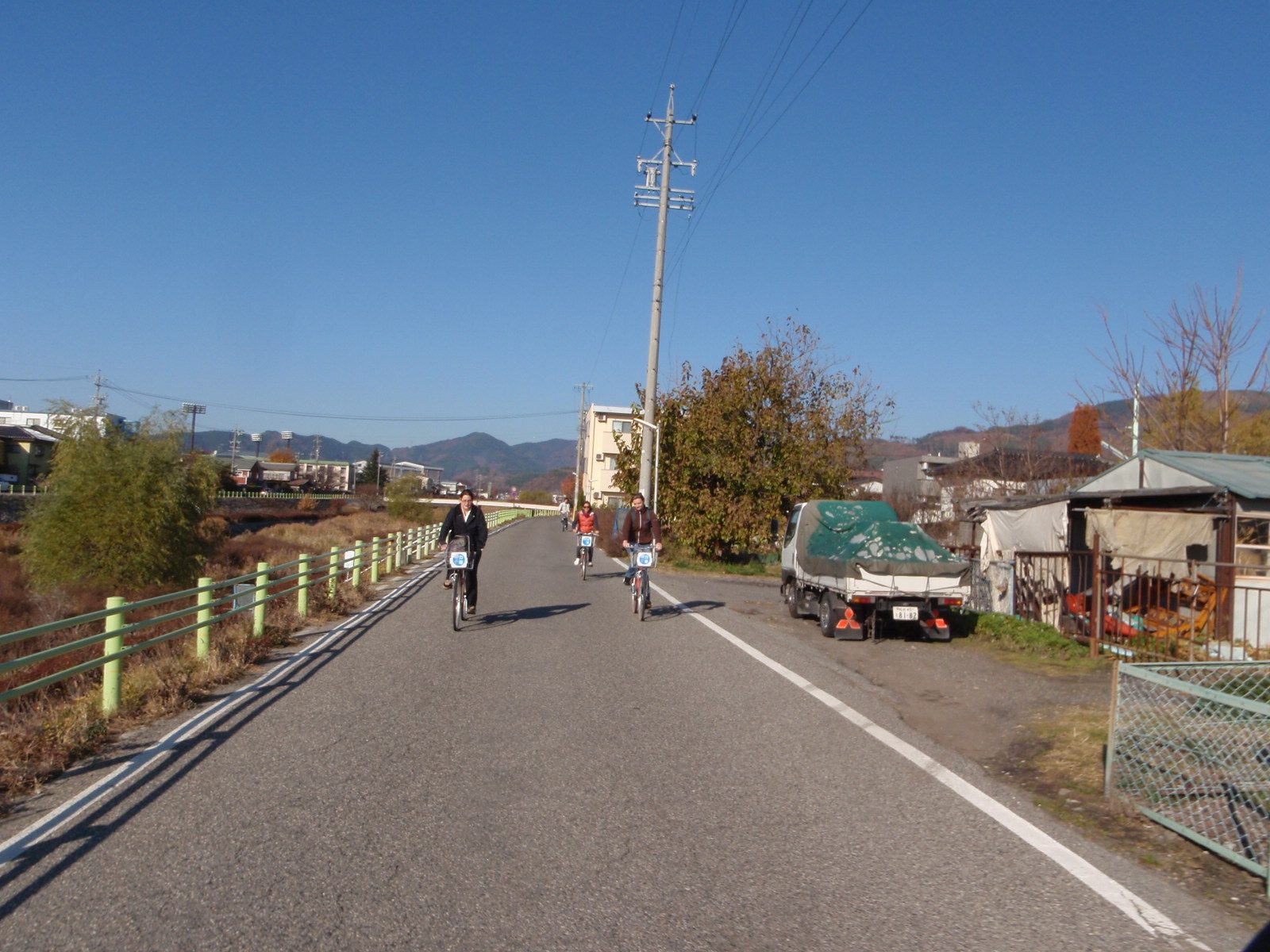 Cass, Sara and Jennie biking in Japan.