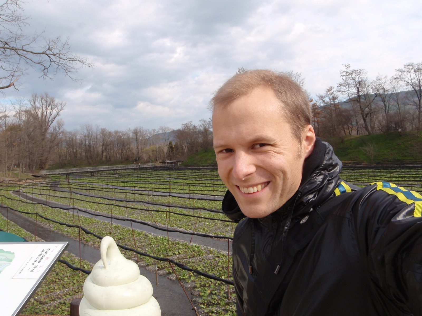 John at the wasabi farm, with a wasabi ice cream cone.