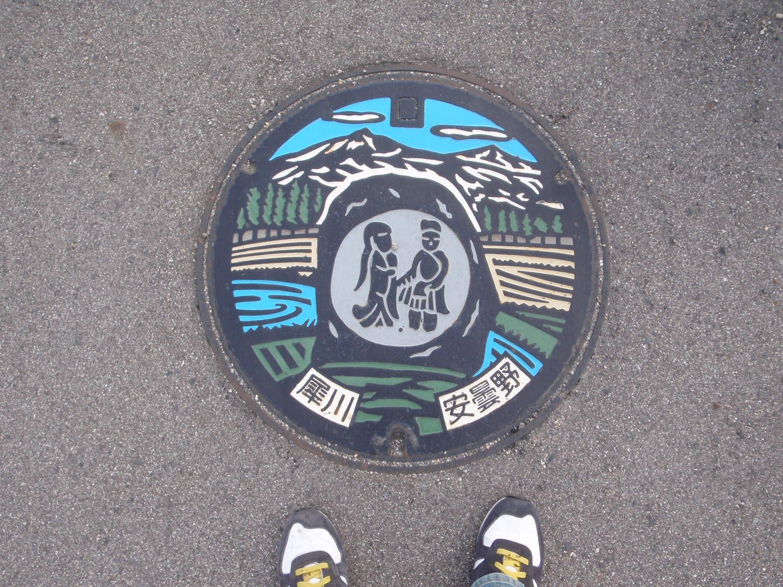 In Hotaka the manhole covers are painted.
