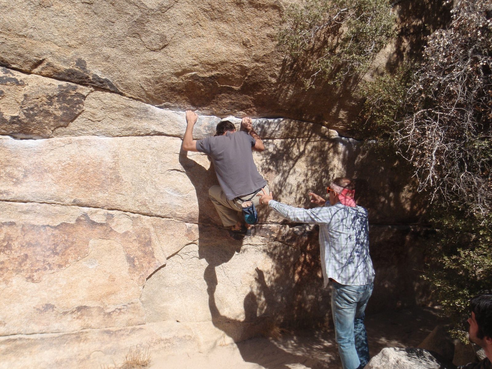 John spotting Jim on a really hard bouldering problem that was over 160 feet long.