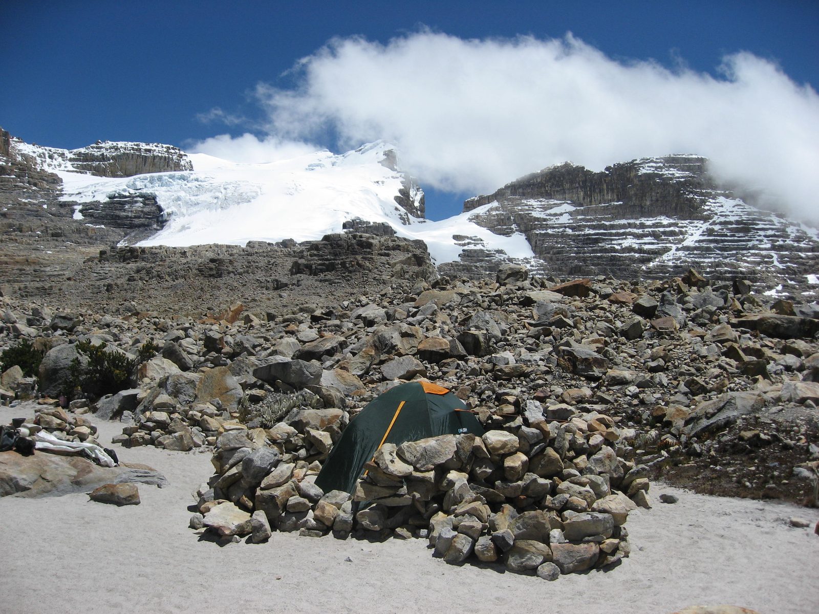 Here is my tent with the rainfly reinstalled in a hopefully much more wind-resistant manner. ...