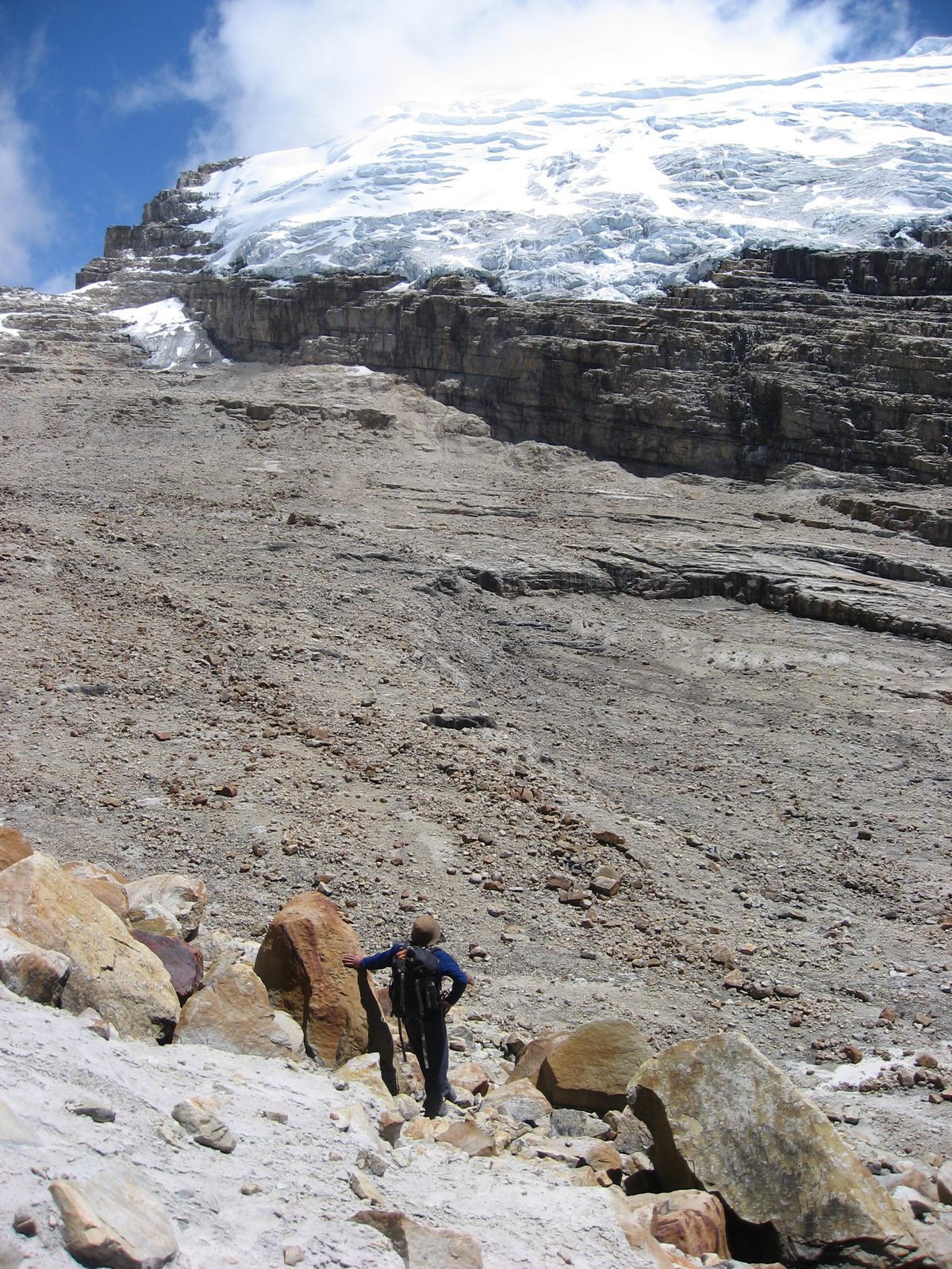 Rodrigo scouting a route through the boulder field.