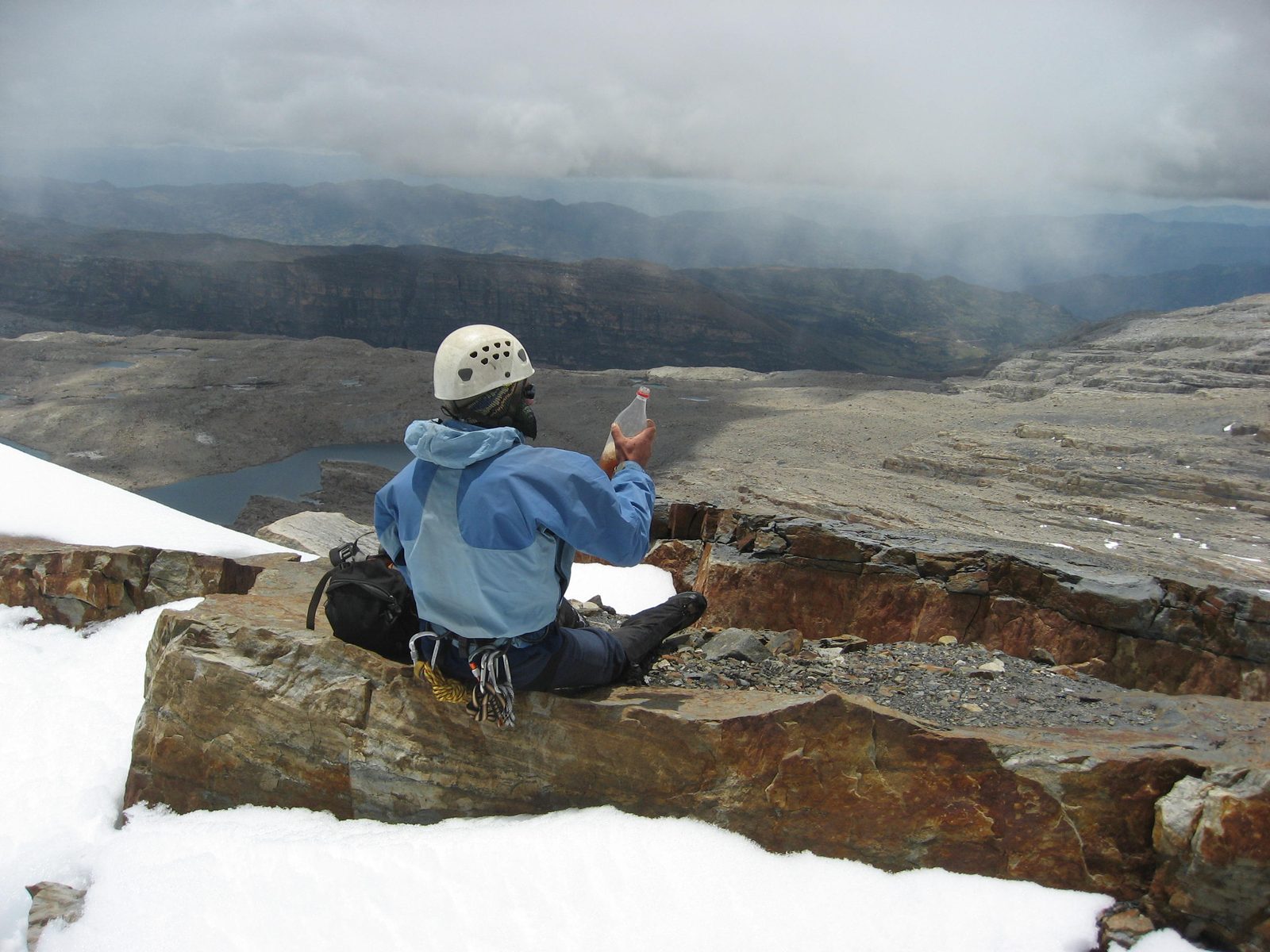 Rodrigo rests and prepares lunch at the summit of Portales.