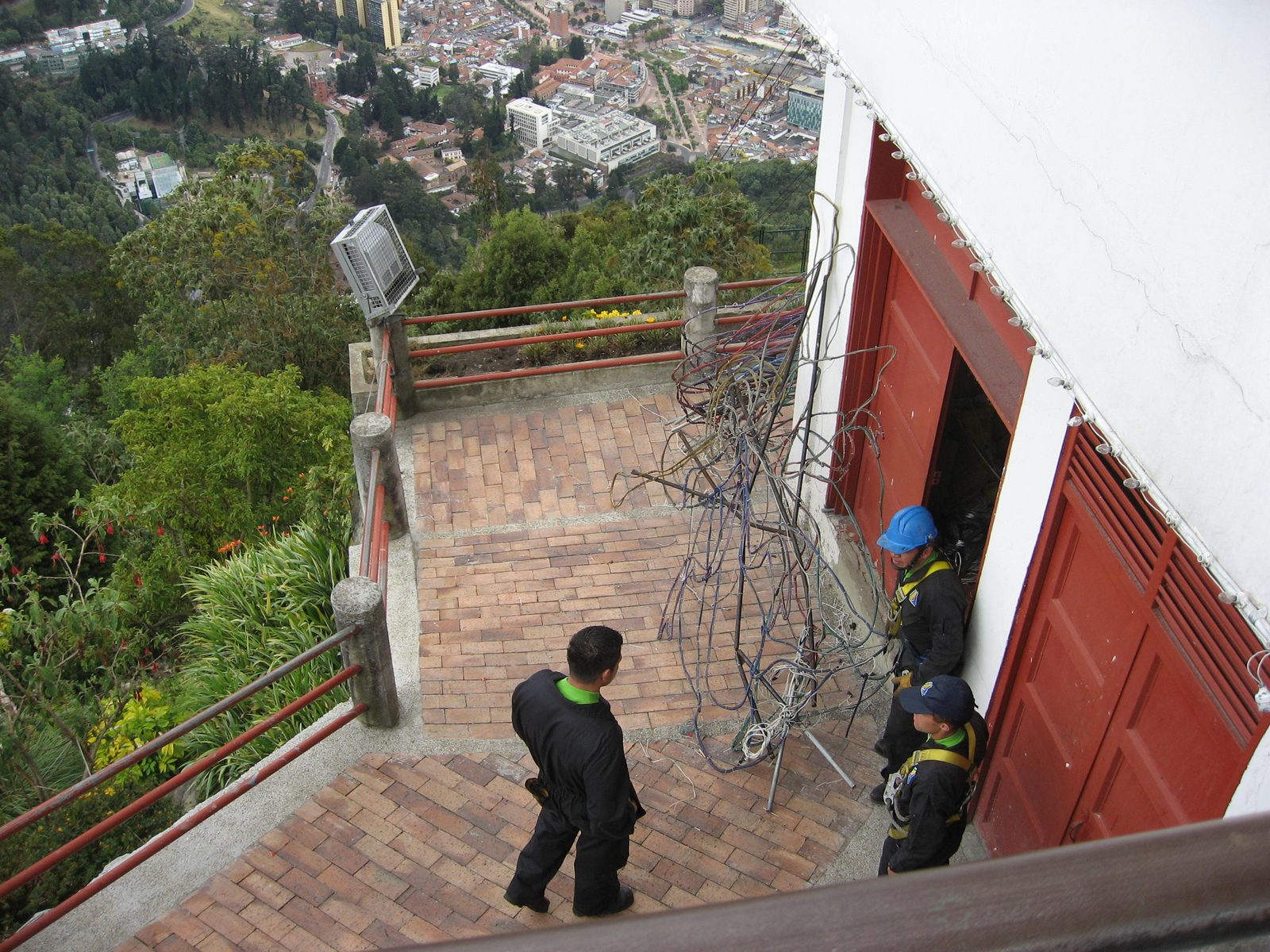 What a fun job: these guys got to go out on the cables of the gondola to perform maintenance work.
