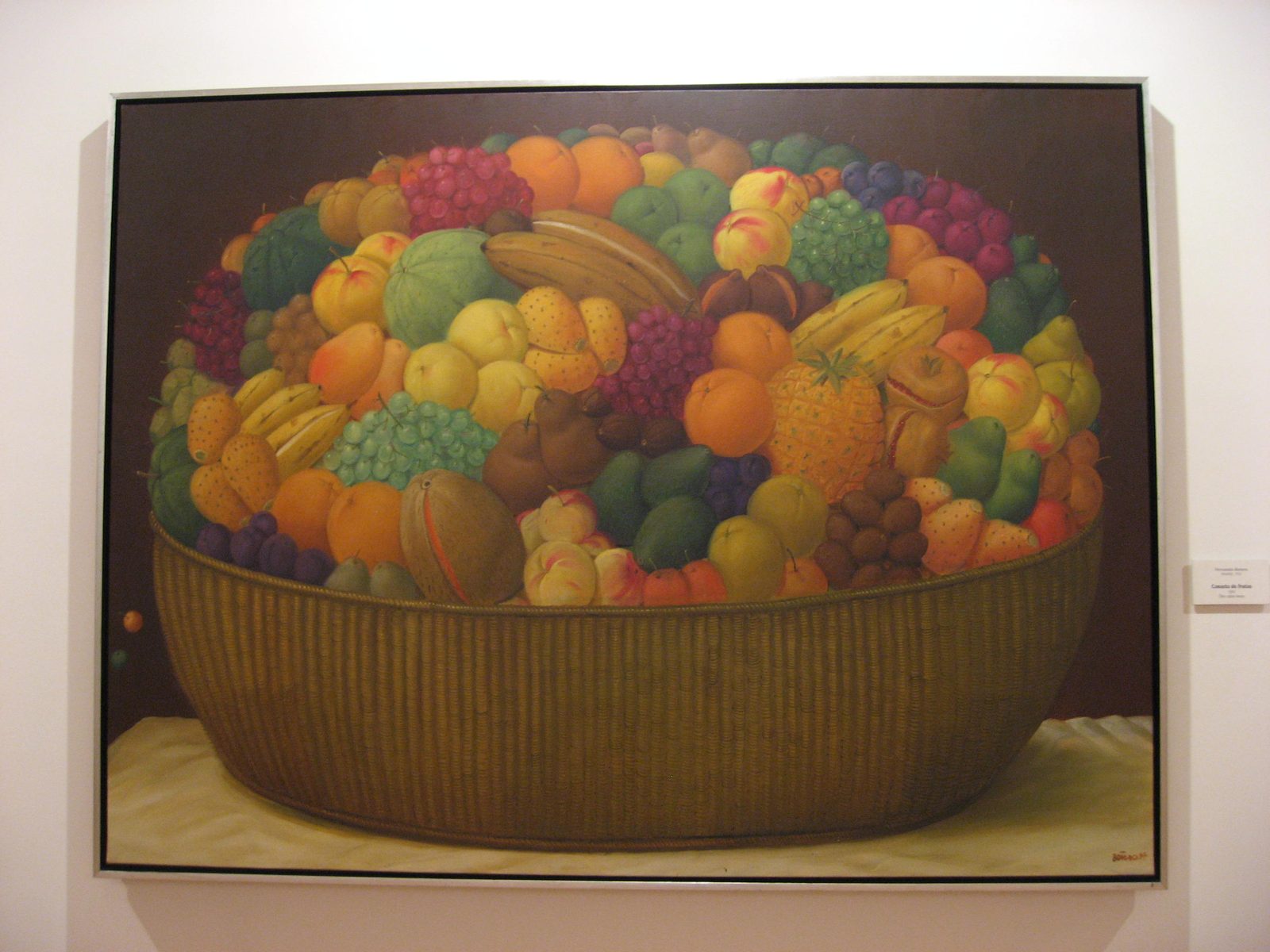 A plump bowl of fruit by Fernando Botero.