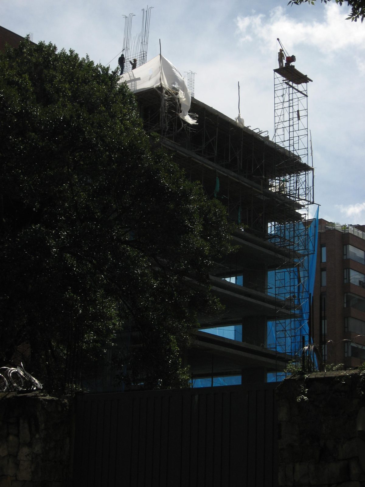 Catherine, this shot's for you.  I thought you'd like the "tower crane" being used to build this...